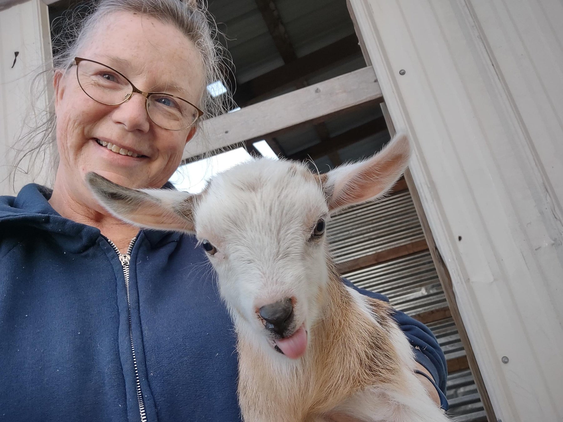 Ann Nunweiler with a young goat